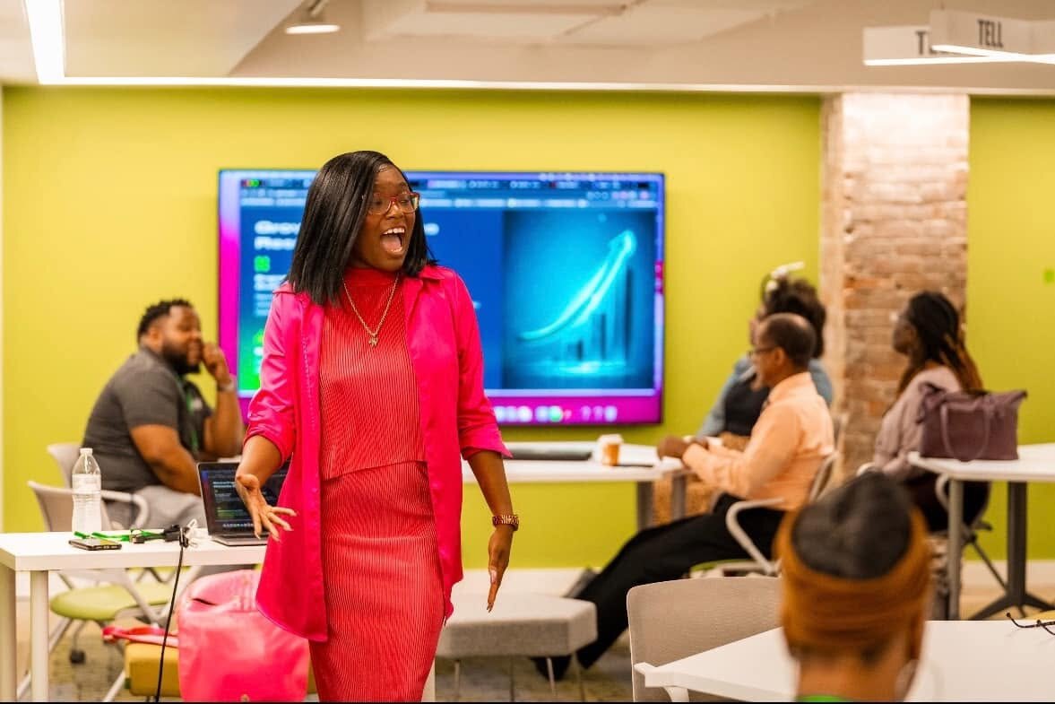 Whitney engaging participants during a hands-on workshop